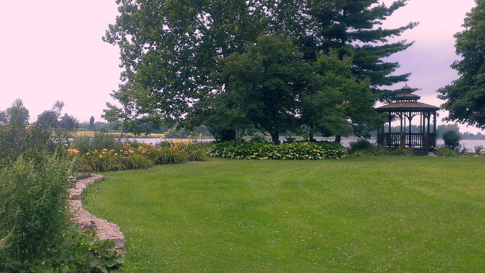 Daylily flowerbeds on the left as you walk onto the Island
